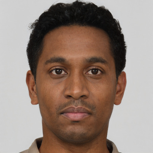 Neutral black young-adult male with short  black hair and brown eyes