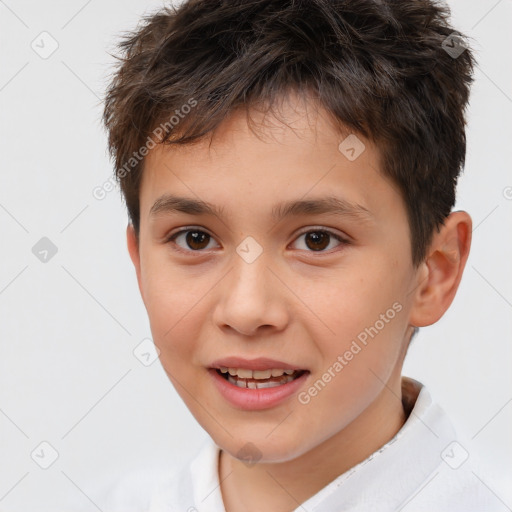 Joyful white child male with short  brown hair and brown eyes