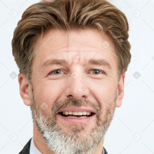 Joyful white adult male with short  brown hair and grey eyes