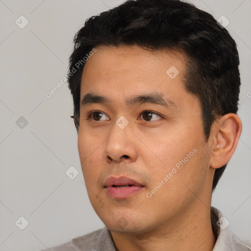 Neutral asian young-adult male with short  black hair and brown eyes