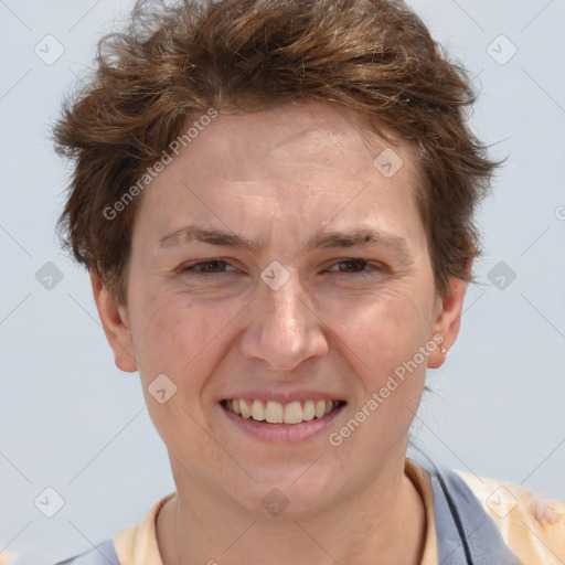 Joyful white adult female with short  brown hair and brown eyes