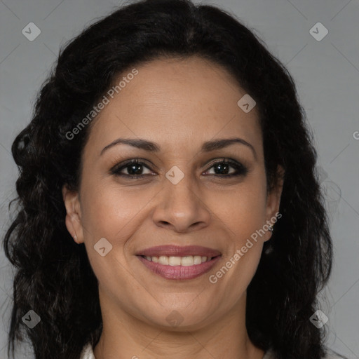 Joyful latino adult female with long  brown hair and brown eyes