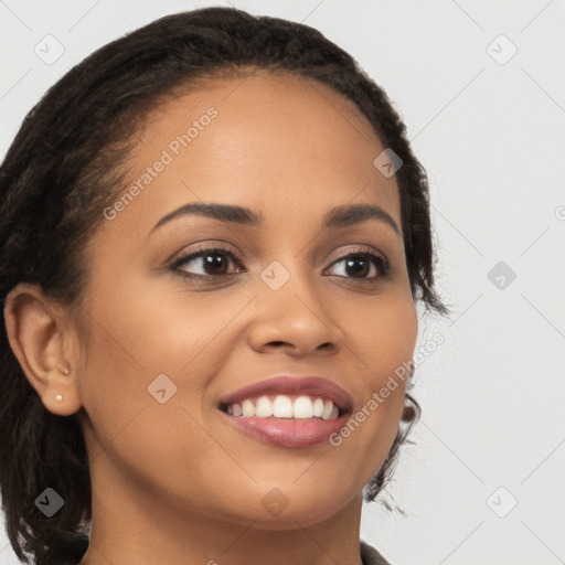 Joyful latino young-adult female with long  brown hair and brown eyes