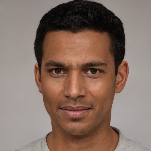 Neutral white young-adult male with short  black hair and brown eyes