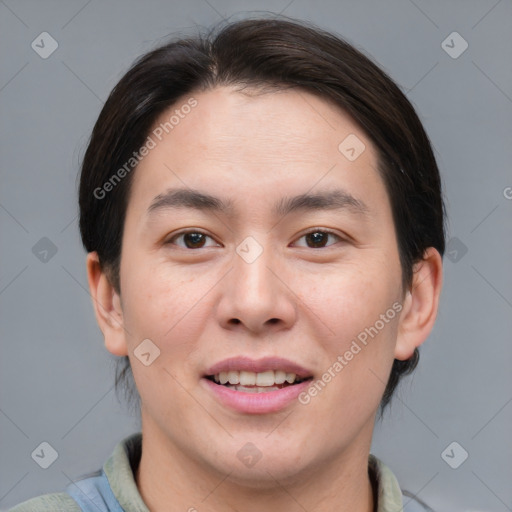 Joyful asian young-adult male with short  brown hair and brown eyes