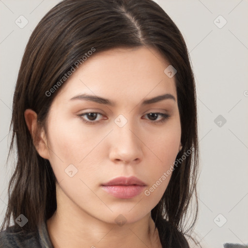 Neutral white young-adult female with long  brown hair and brown eyes