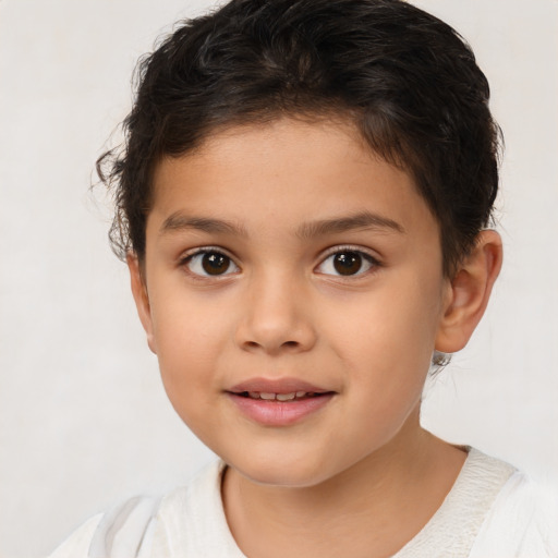 Joyful white child female with short  brown hair and brown eyes