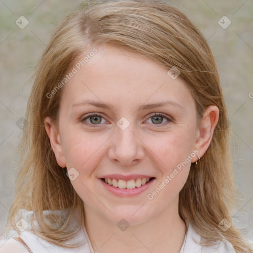 Joyful white young-adult female with medium  brown hair and blue eyes