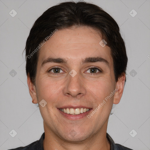 Joyful white adult female with short  brown hair and brown eyes