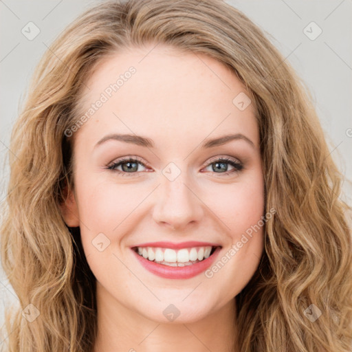 Joyful white young-adult female with long  brown hair and green eyes