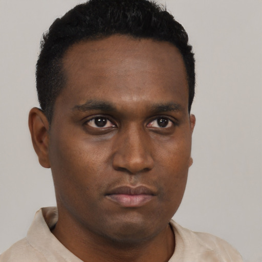 Neutral black young-adult male with short  black hair and brown eyes