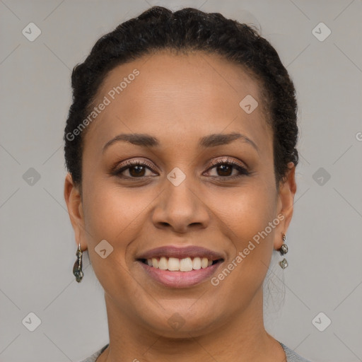 Joyful black young-adult female with short  brown hair and brown eyes