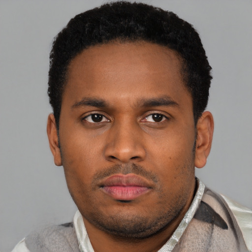 Neutral latino young-adult male with short  brown hair and brown eyes