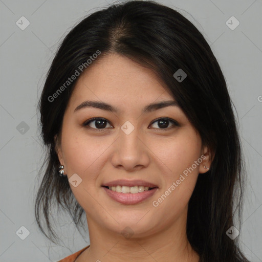 Joyful asian young-adult female with long  brown hair and brown eyes