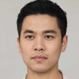 Neutral asian young-adult male with short  black hair and brown eyes