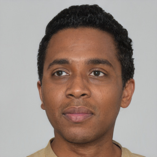 Neutral black adult male with short  black hair and brown eyes