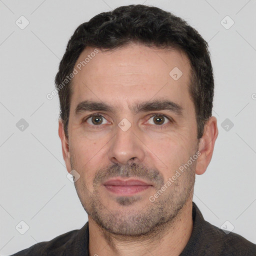 Neutral white adult male with short  black hair and brown eyes