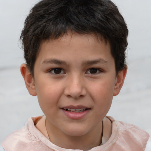 Joyful white child male with short  brown hair and brown eyes