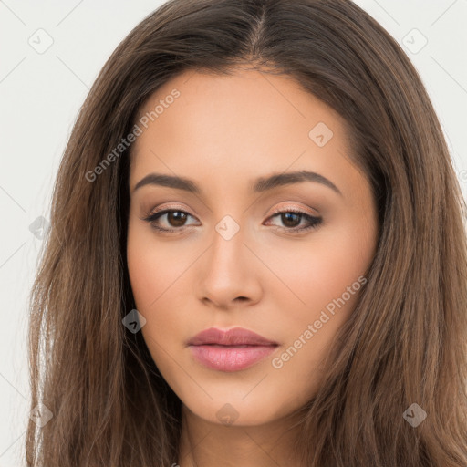 Neutral white young-adult female with long  brown hair and brown eyes