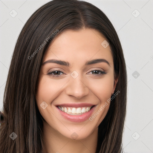 Joyful white young-adult female with long  brown hair and brown eyes