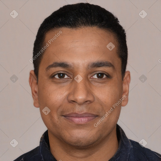 Joyful latino young-adult male with short  black hair and brown eyes