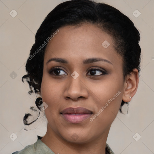 Joyful black young-adult female with medium  brown hair and brown eyes