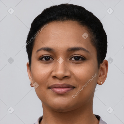 Joyful latino young-adult female with short  brown hair and brown eyes