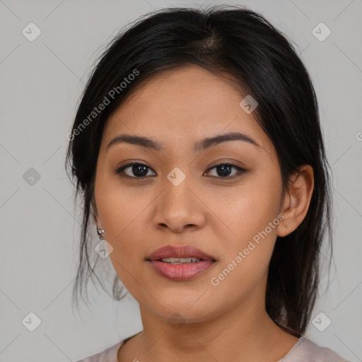 Joyful asian young-adult female with medium  brown hair and brown eyes