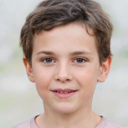 Joyful white child male with short  brown hair and grey eyes