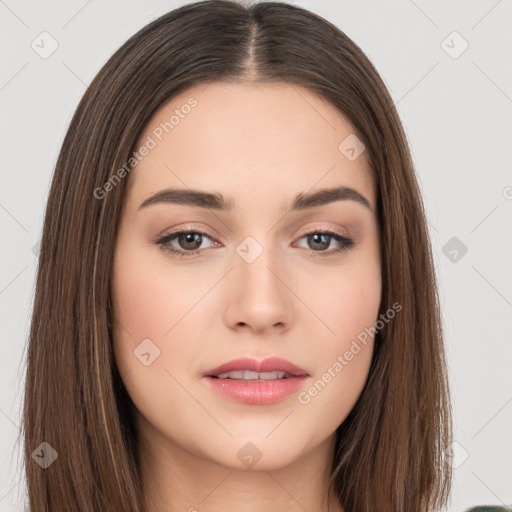 Neutral white young-adult female with long  brown hair and brown eyes