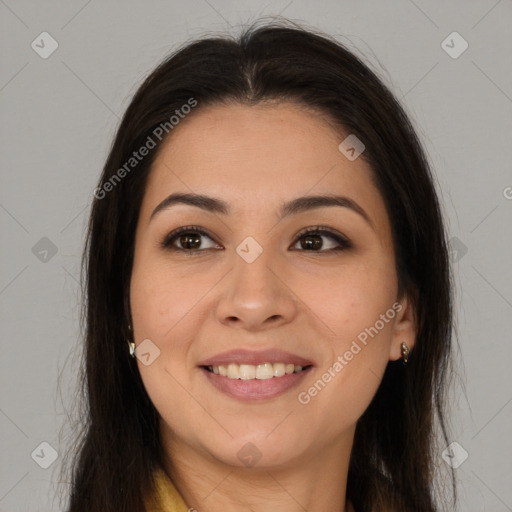 Joyful latino young-adult female with long  brown hair and brown eyes