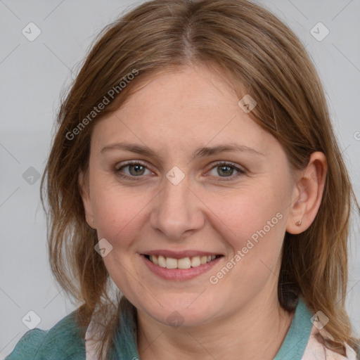 Joyful white young-adult female with medium  brown hair and blue eyes