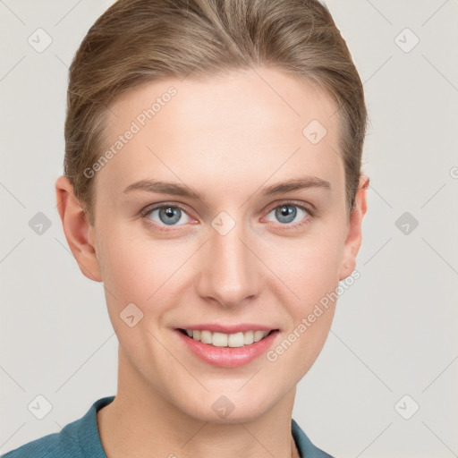 Joyful white young-adult female with short  brown hair and grey eyes