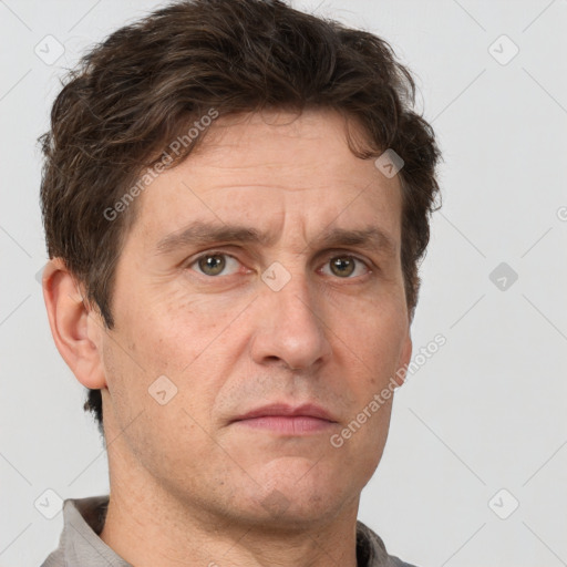 Neutral white adult male with short  brown hair and brown eyes