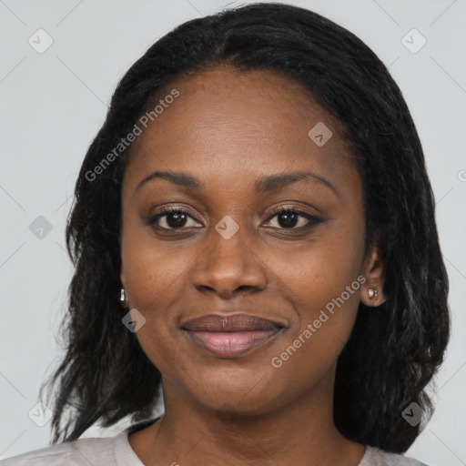 Joyful black young-adult female with medium  black hair and brown eyes