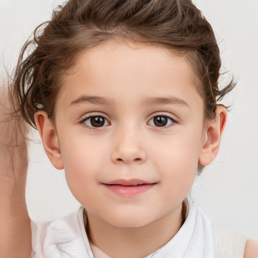 Joyful white child female with short  brown hair and brown eyes