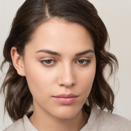 Neutral white young-adult female with medium  brown hair and brown eyes