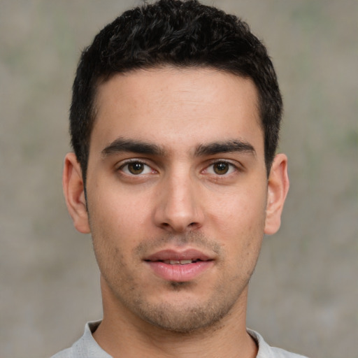 Neutral white young-adult male with short  brown hair and brown eyes