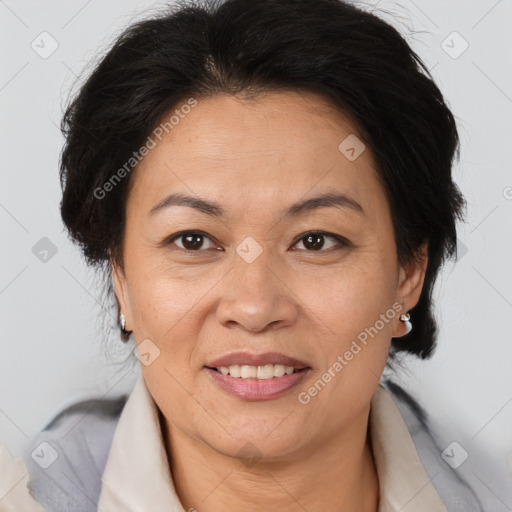 Joyful white adult female with medium  brown hair and brown eyes