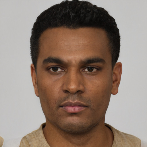 Neutral black young-adult male with short  black hair and brown eyes