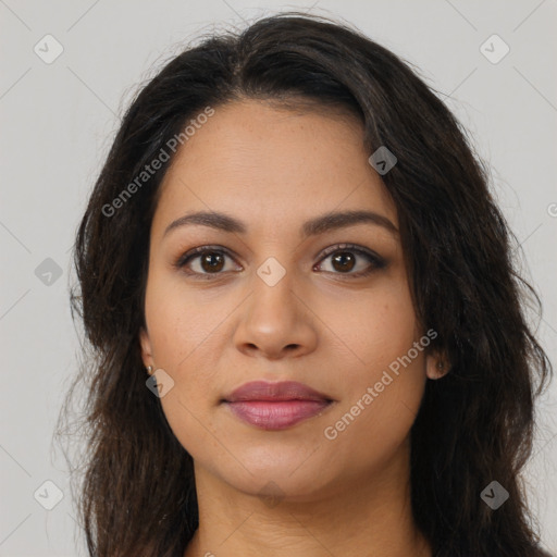 Joyful latino young-adult female with long  brown hair and brown eyes