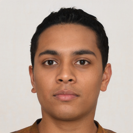 Neutral latino young-adult male with short  black hair and brown eyes