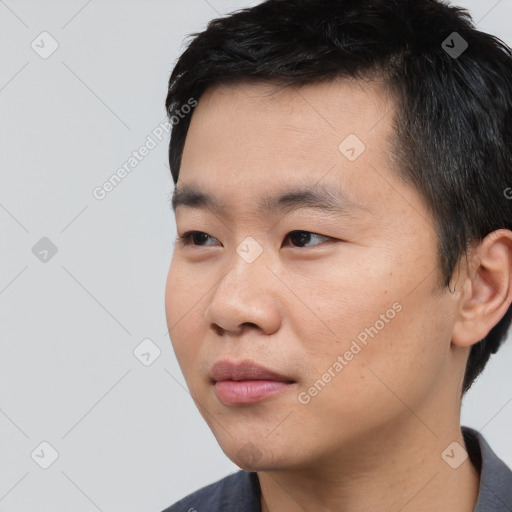 Neutral asian young-adult male with short  black hair and brown eyes