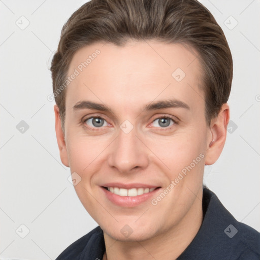 Joyful white young-adult female with short  brown hair and grey eyes