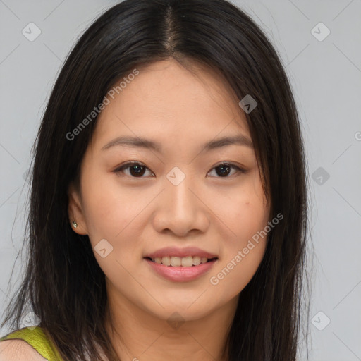 Joyful asian young-adult female with long  brown hair and brown eyes