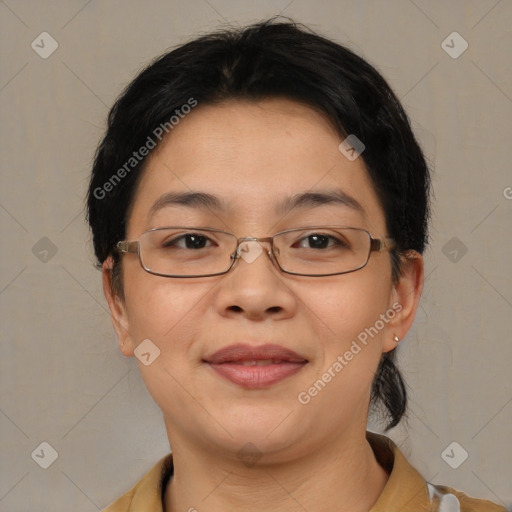 Joyful latino adult female with short  brown hair and brown eyes