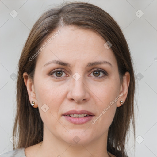 Joyful white adult female with medium  brown hair and grey eyes