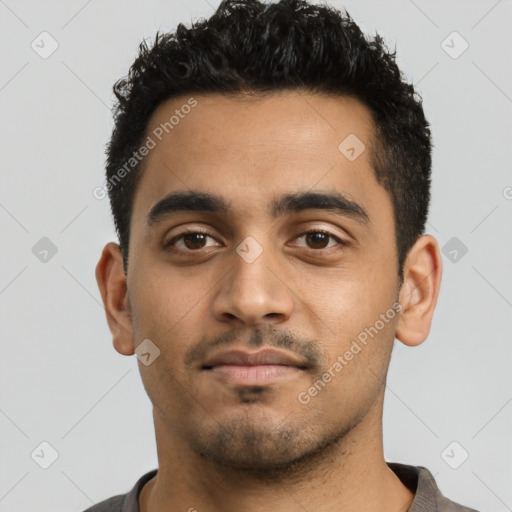 Neutral latino young-adult male with short  black hair and brown eyes