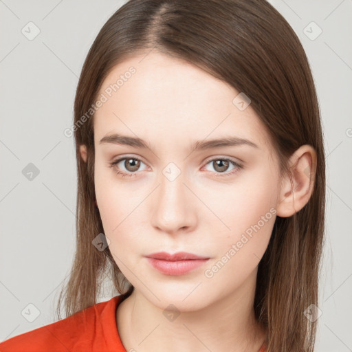 Neutral white young-adult female with long  brown hair and brown eyes