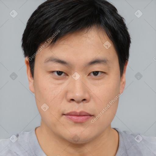 Neutral asian young-adult male with short  brown hair and brown eyes